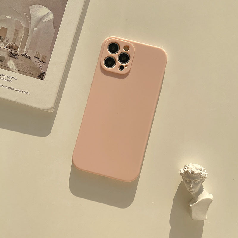 a cell phone and a statue
