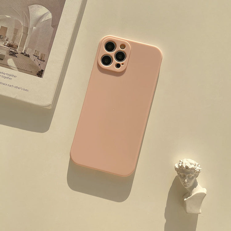 a cell phone and a statue