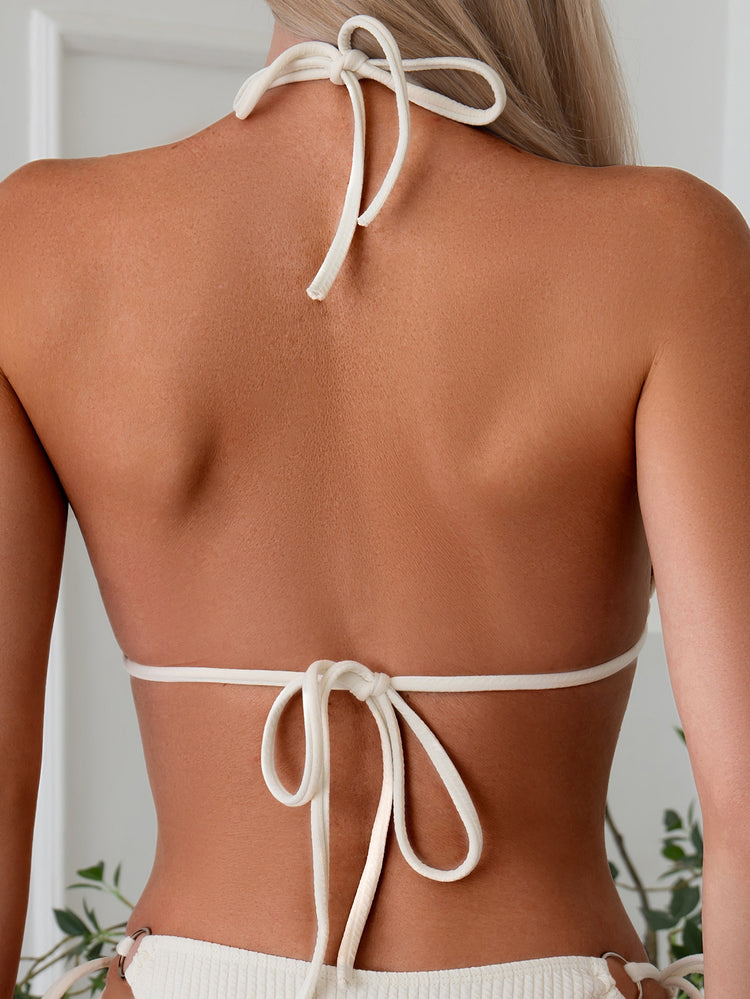 a woman wearing a garment top