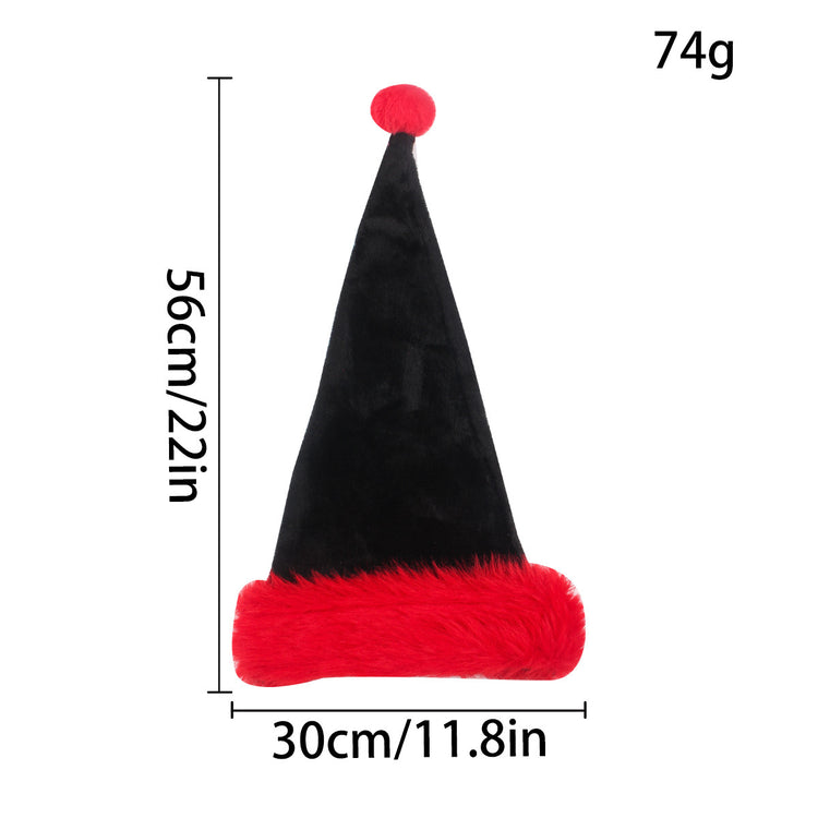 a black and red hat with a red pompom