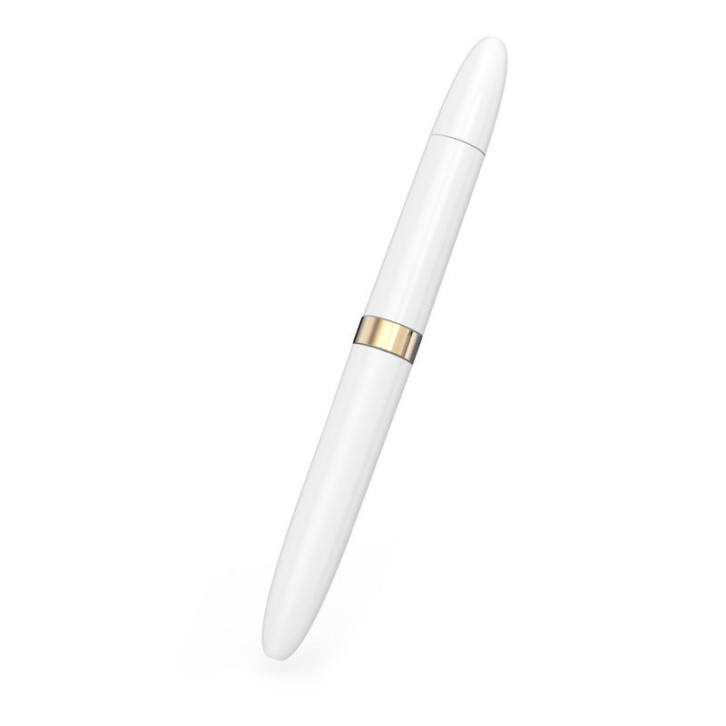 a white pen with gold trim