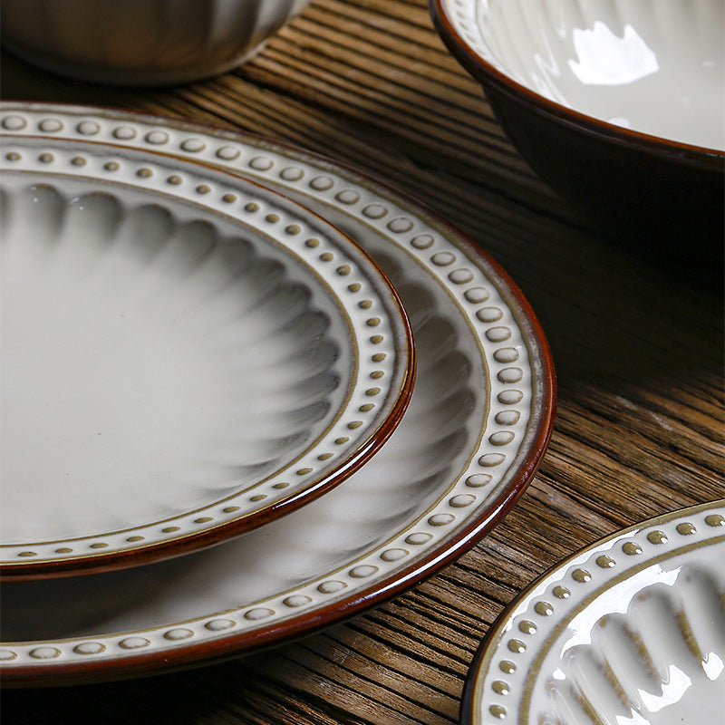 a group of plates and bowls on a table
