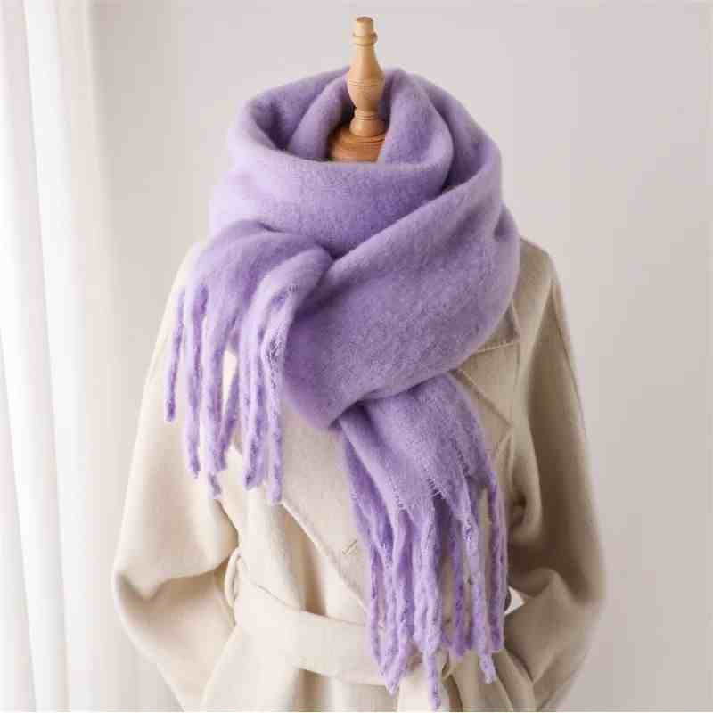 a mannequin wearing a scarf