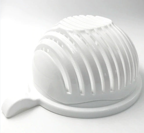 a white plastic fruit strainer