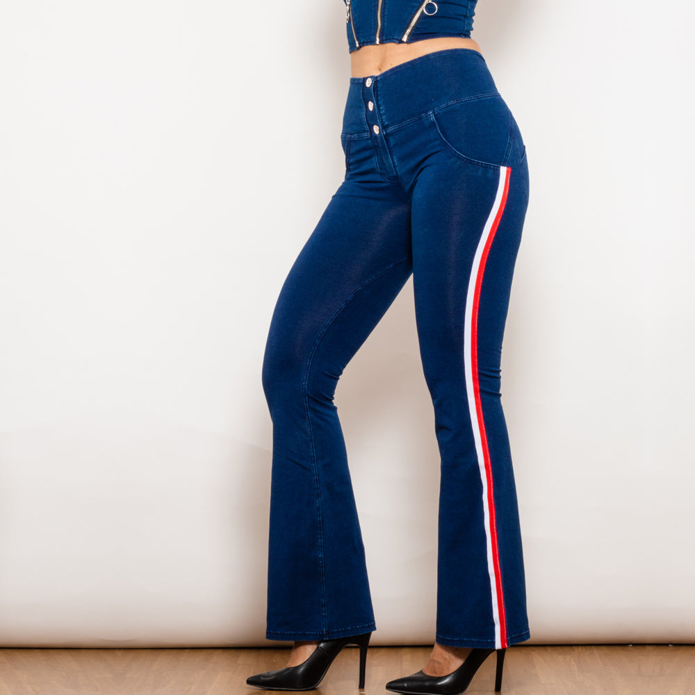 a woman wearing blue jeans