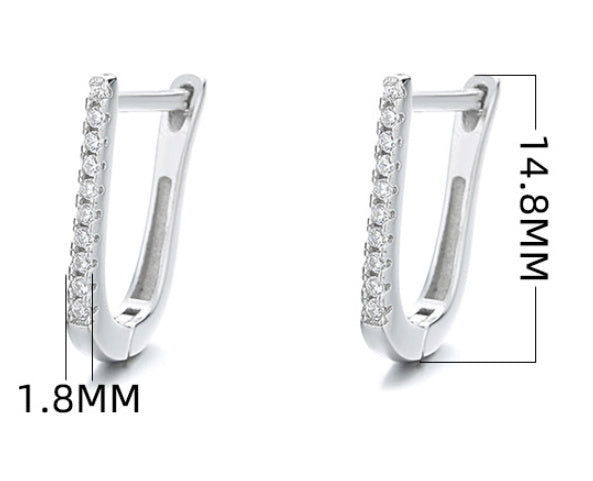 a pair of diamond earrings