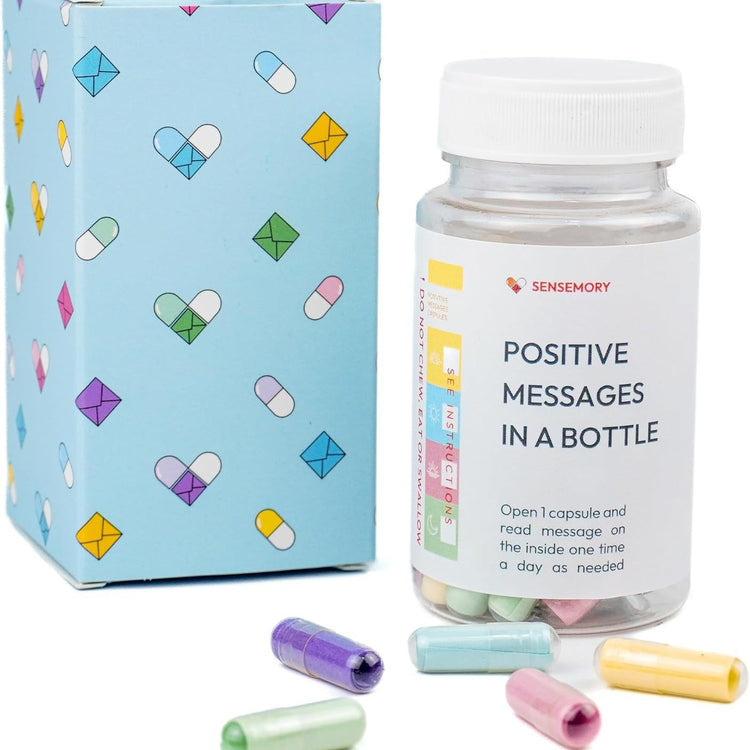 a bottle of pills next to a box