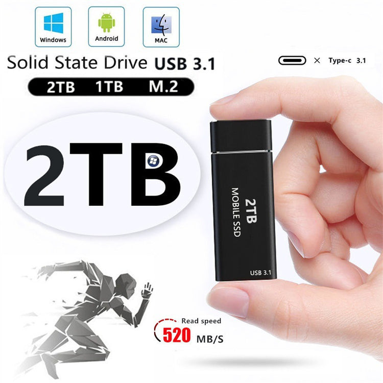 a hand holding a black usb drive