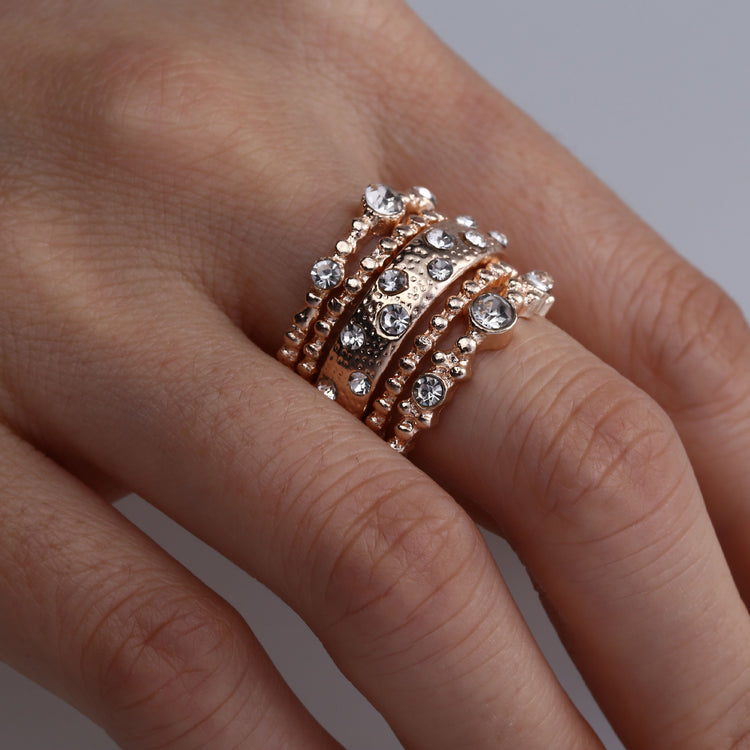 a hand with a ring on it