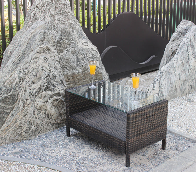 a table with two glasses of orange juice on it