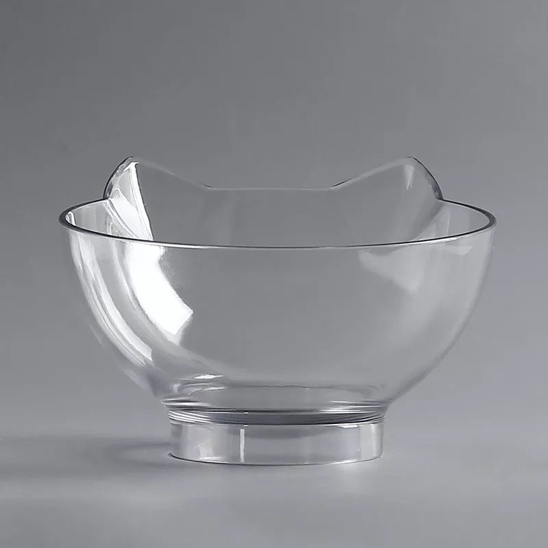 a clear glass bowl on a white surface