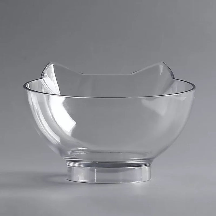 a clear glass bowl on a white surface