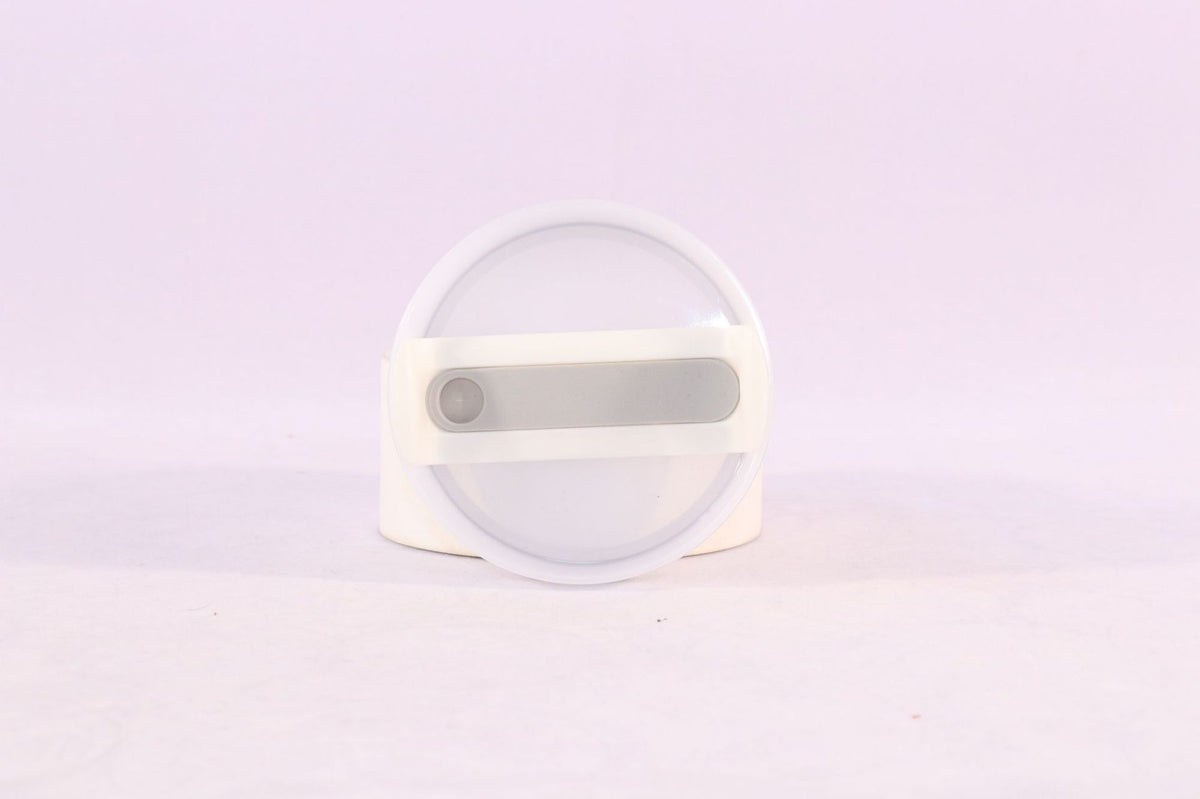 a white round object with a white circle