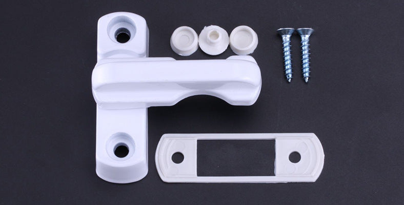 a white plastic window handle with screws and bolts
