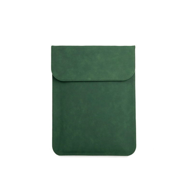 a green leather case with a pocket