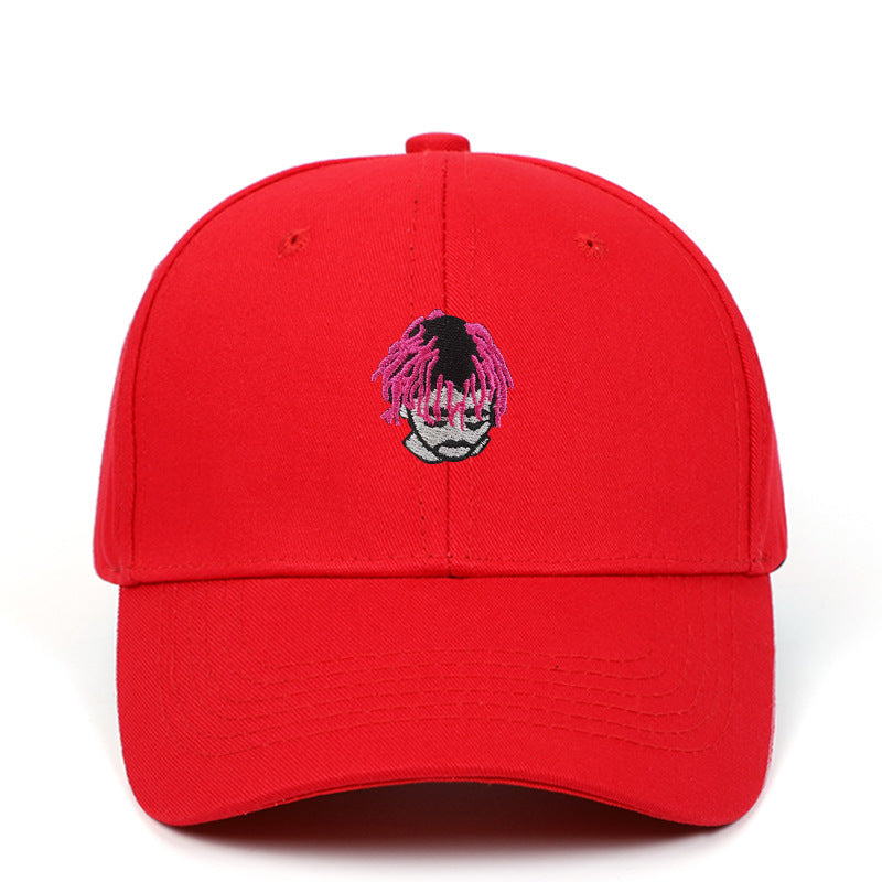 a red hat with a cartoon face on it