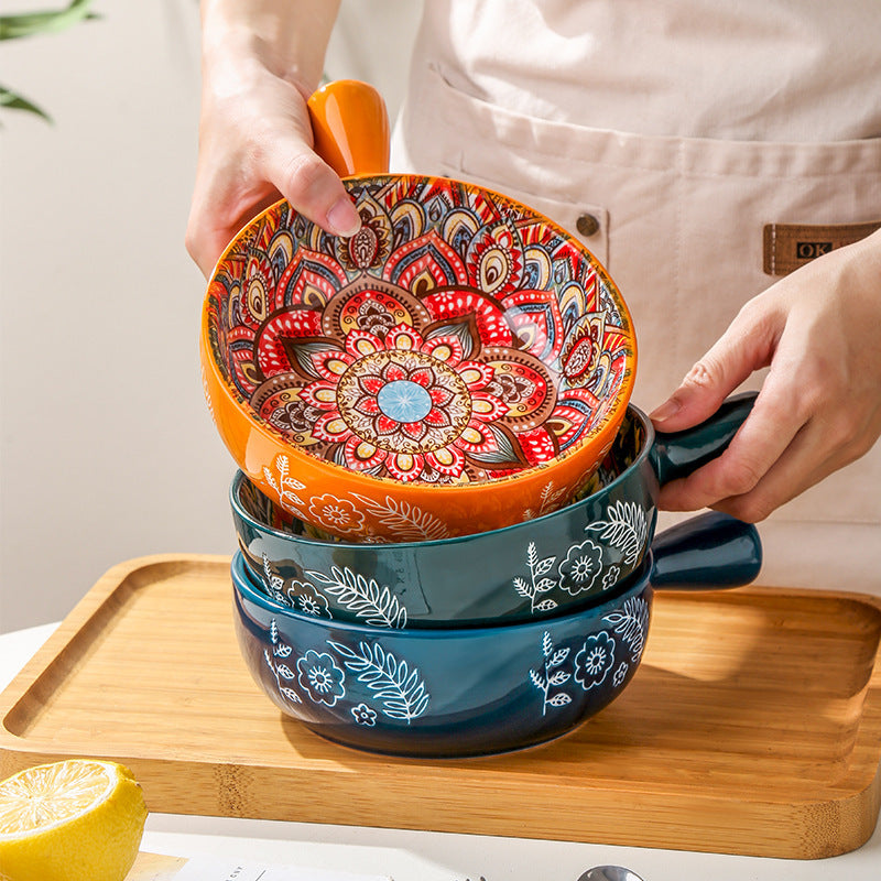 a person holding a bowl in a stack of bowls