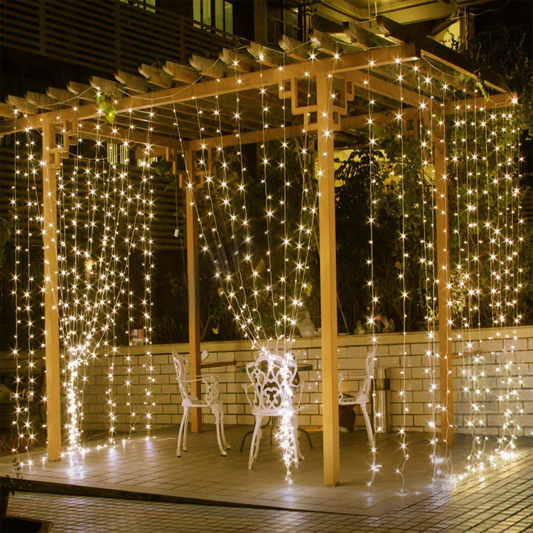 a wooden structure with lights from it