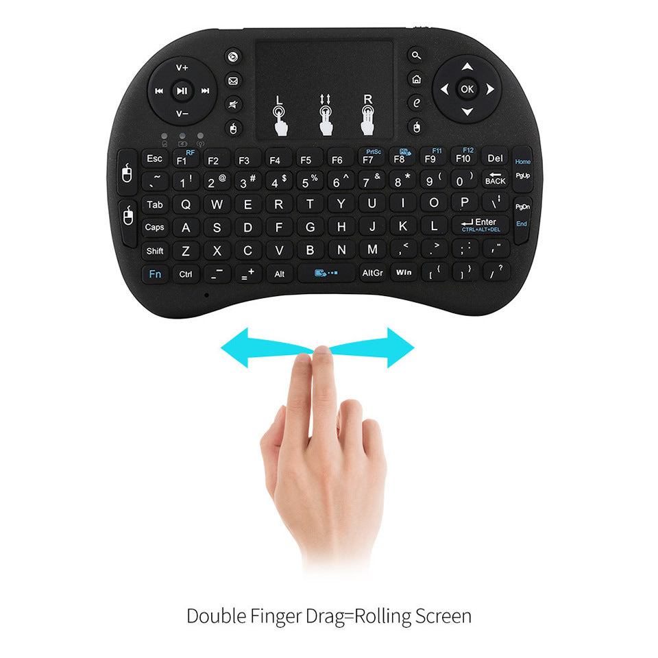 a hand touching a black keyboard