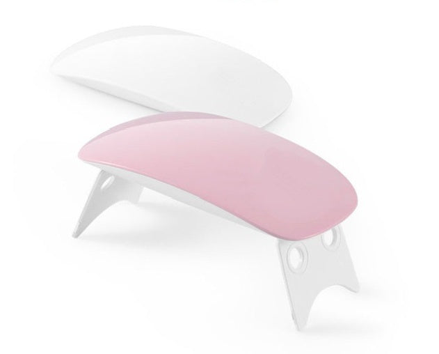 a pink and white nail file
