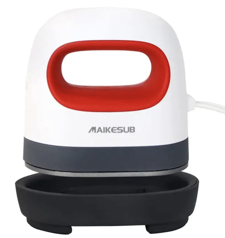 a white and red device with a black tray