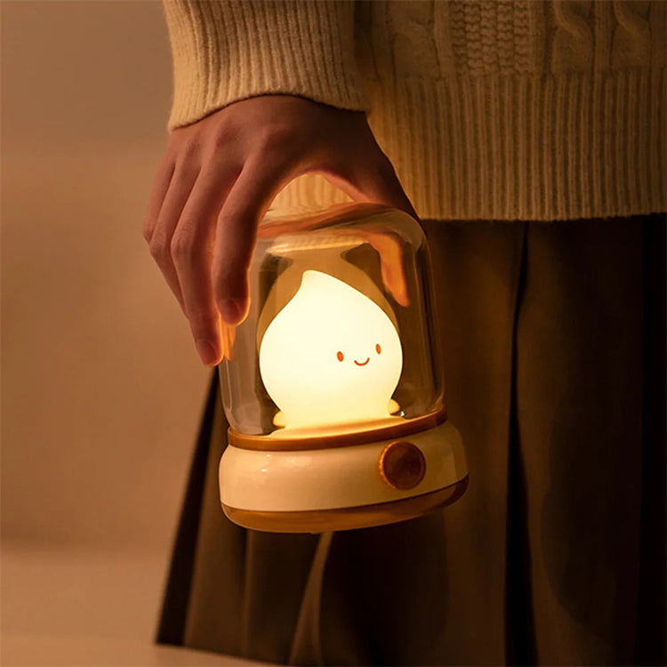 a person holding a small light