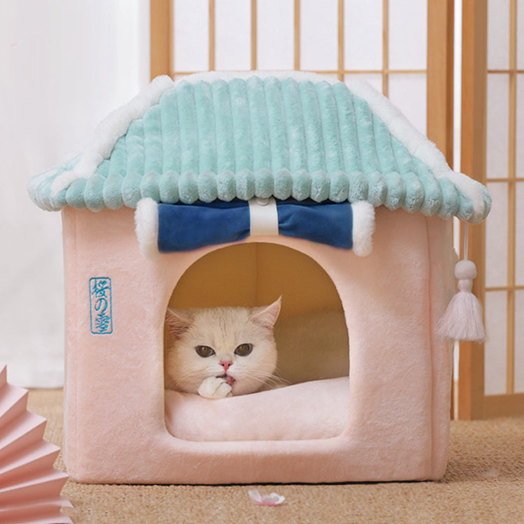a cat in a dog house