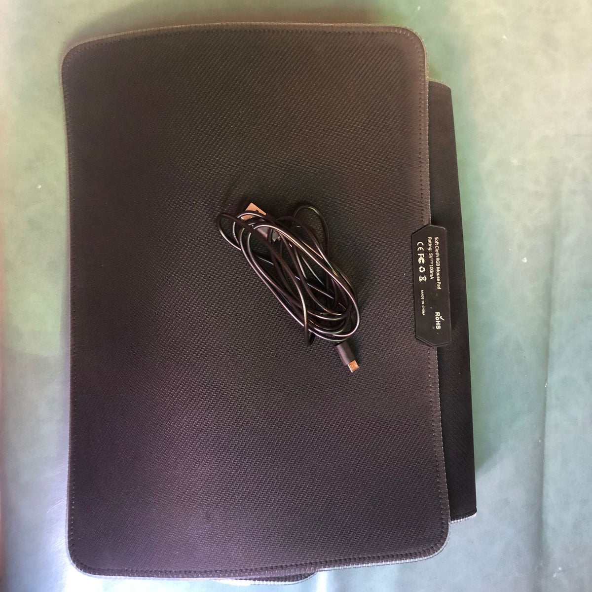 a black case with a cord on it