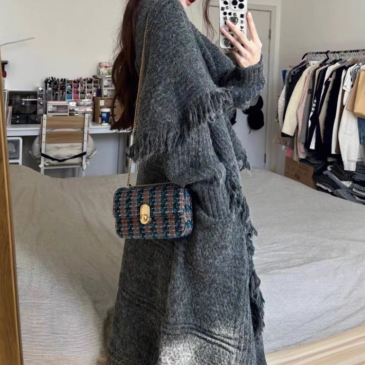 a woman taking a selfie in a bedroom