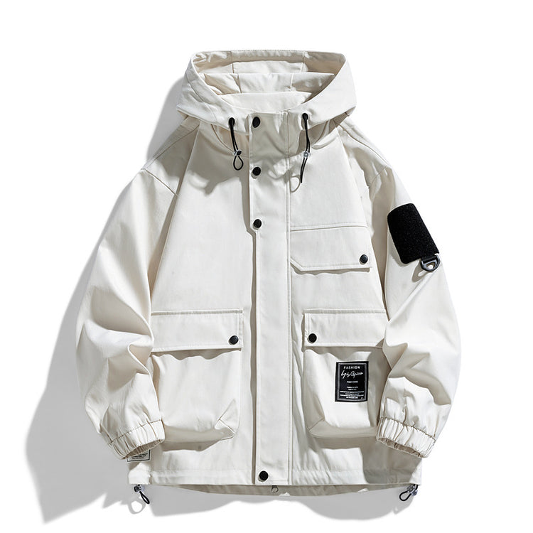 a white jacket with black patches