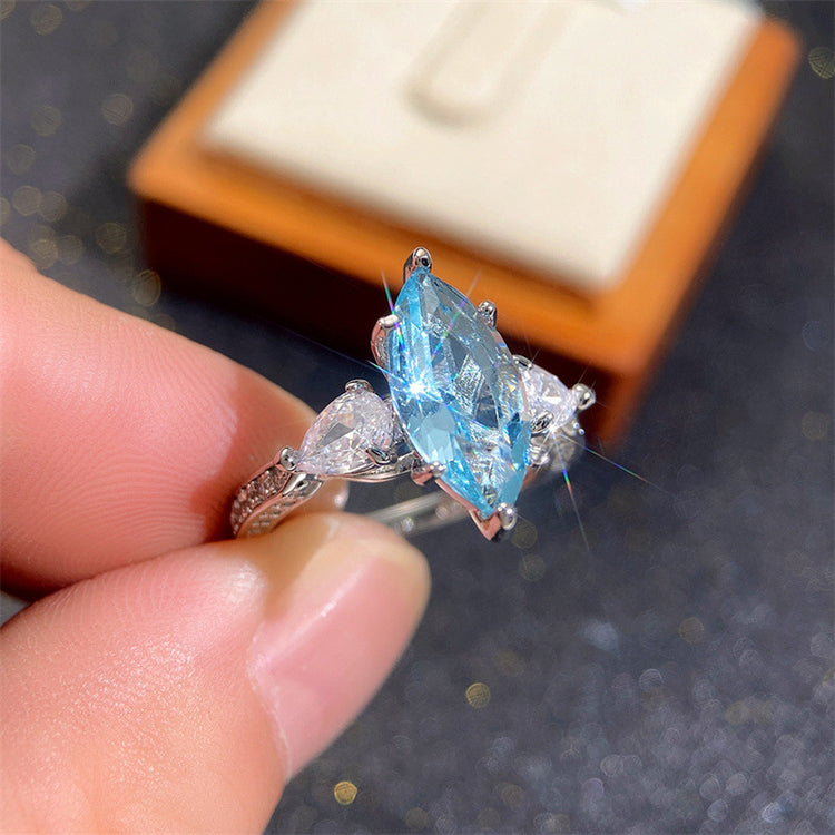 a person holding a ring