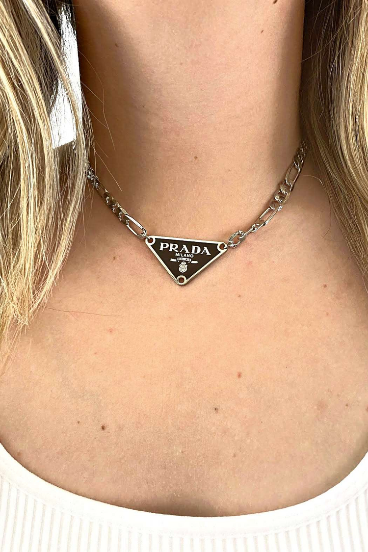 a necklace on a woman's neck
