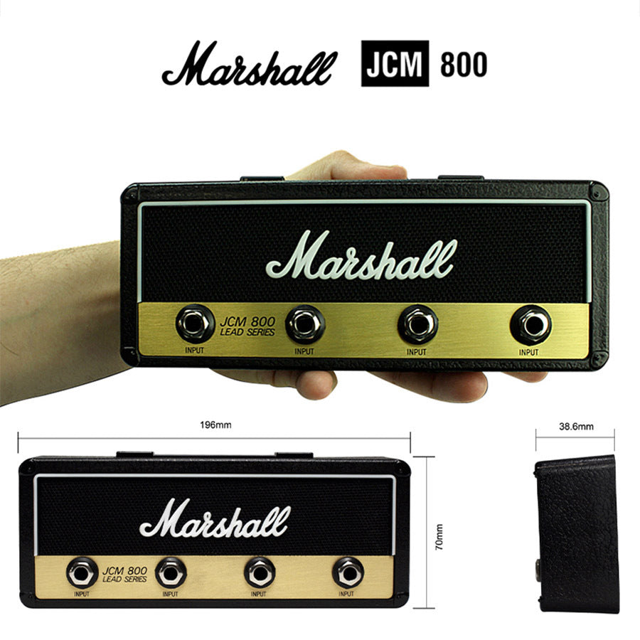 a hand holding a rectangular device with the size of the front and the back