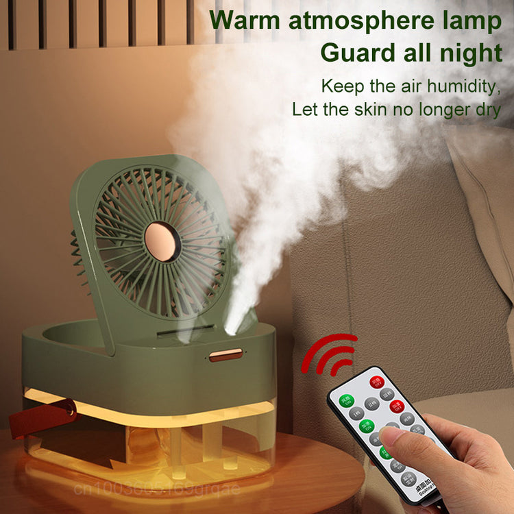 a hand holding a remote control and a fan