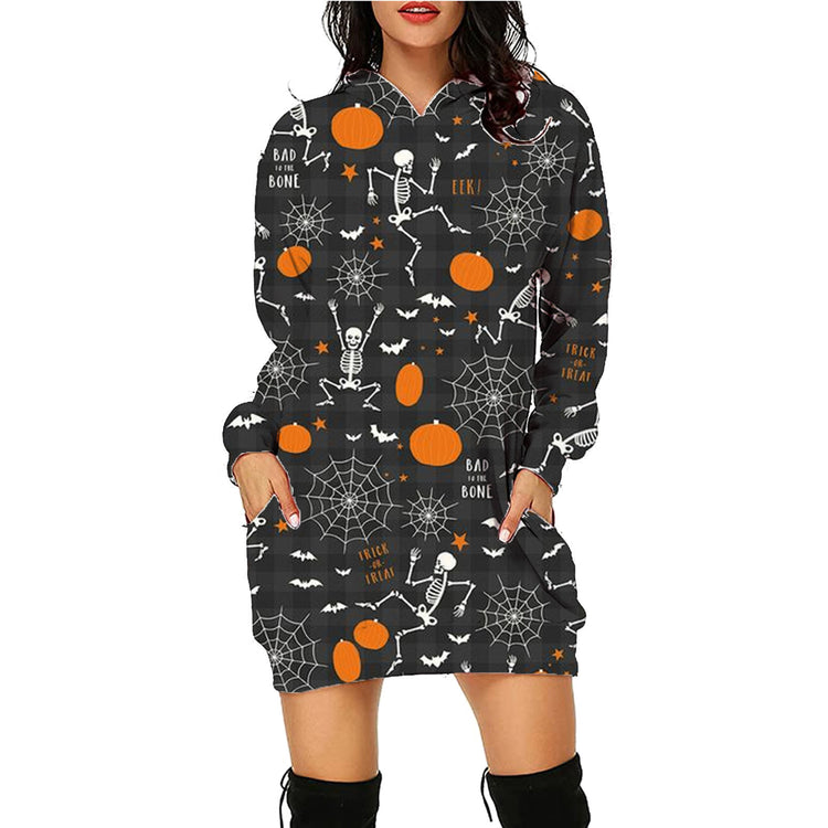 a woman wearing a black and orange dress