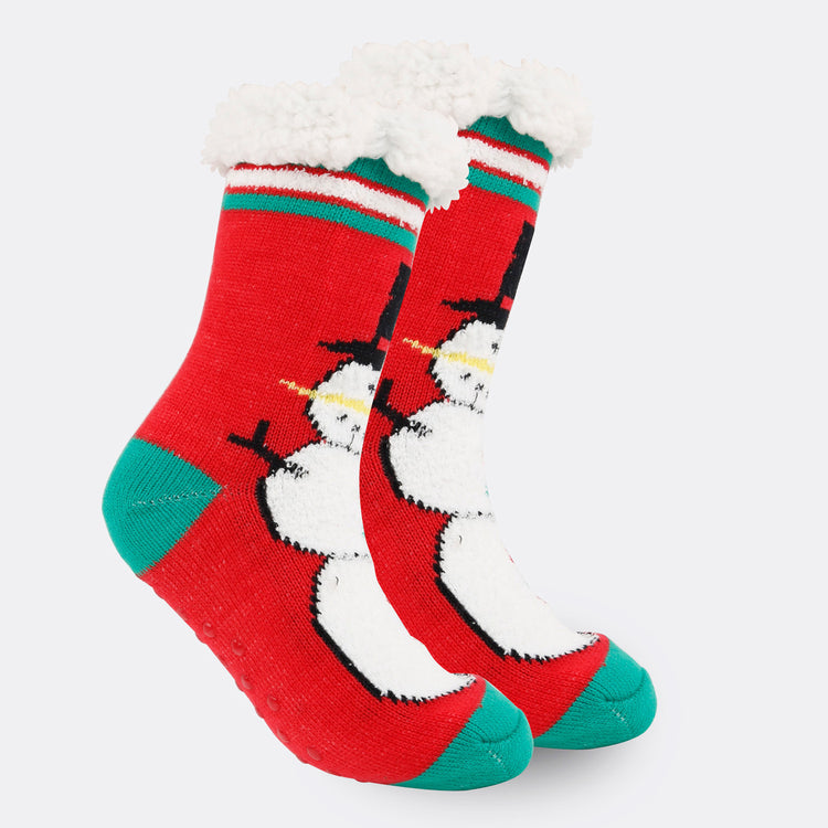 a pair of red and green socks with snowman designs