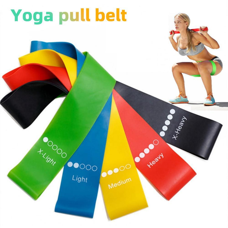 a woman in a garment squatting with a weight belt