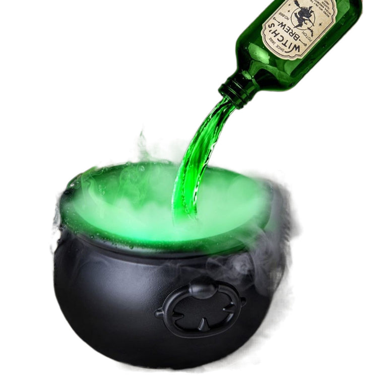 a green liquid being poured into a pot