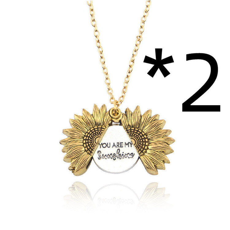a necklace with a pendant and a chain