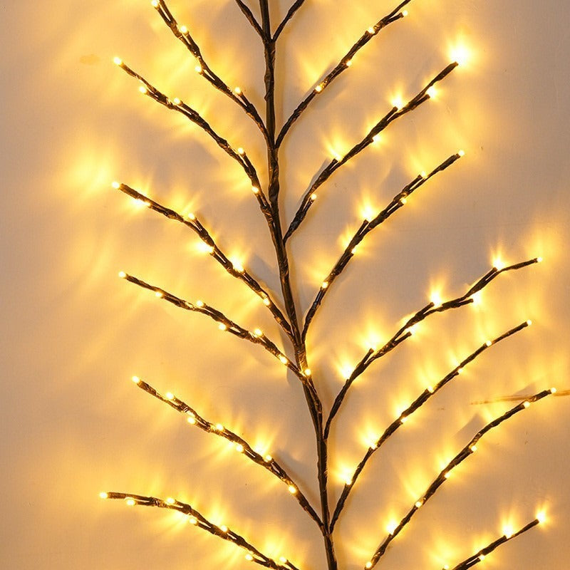 a tree branch with lights