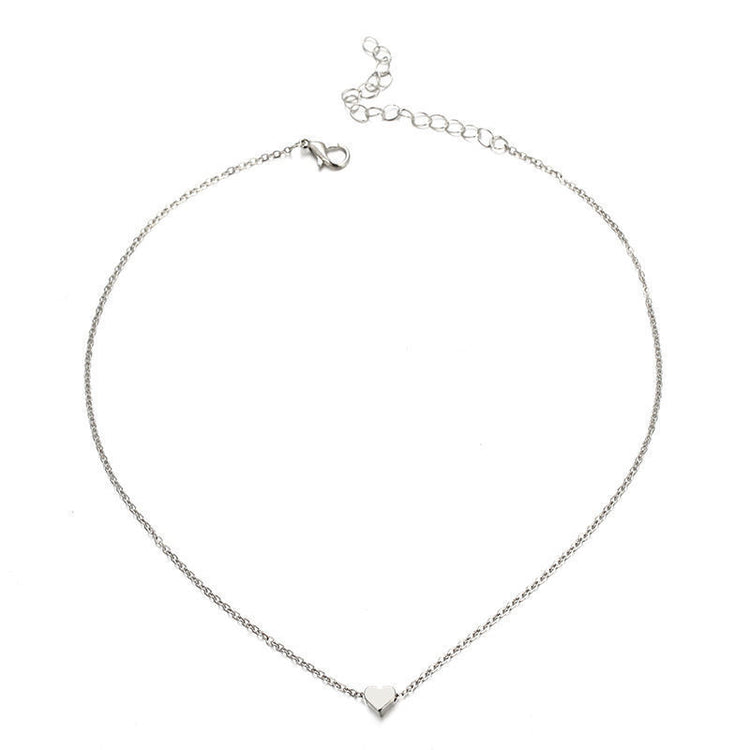 a silver necklace with a heart pendant