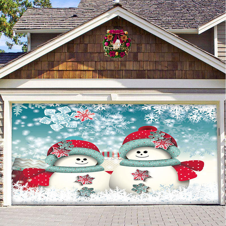 a garage door with snowmen and snowflakes
