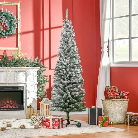 a christmas tree in a room with a fireplace and presents
