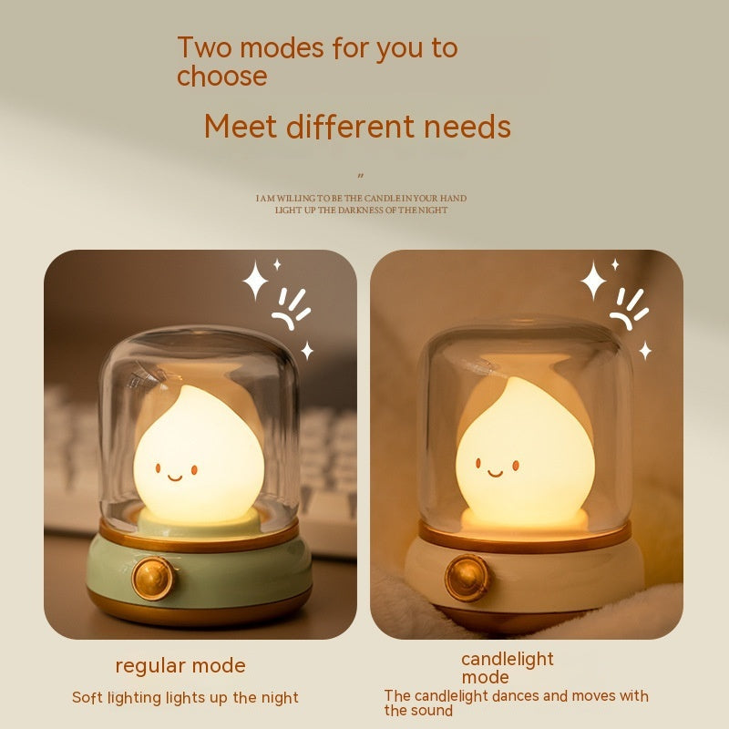 a small light bulb with a face