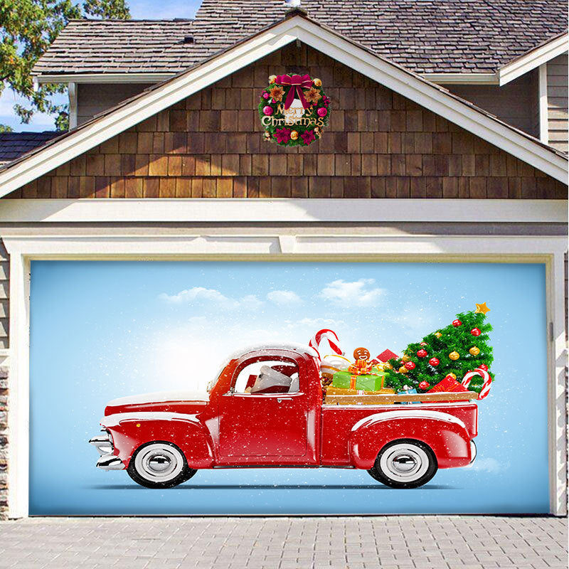 a garage door with a red truck and christmas tree