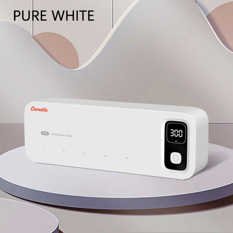 a white rectangular device on a round platform