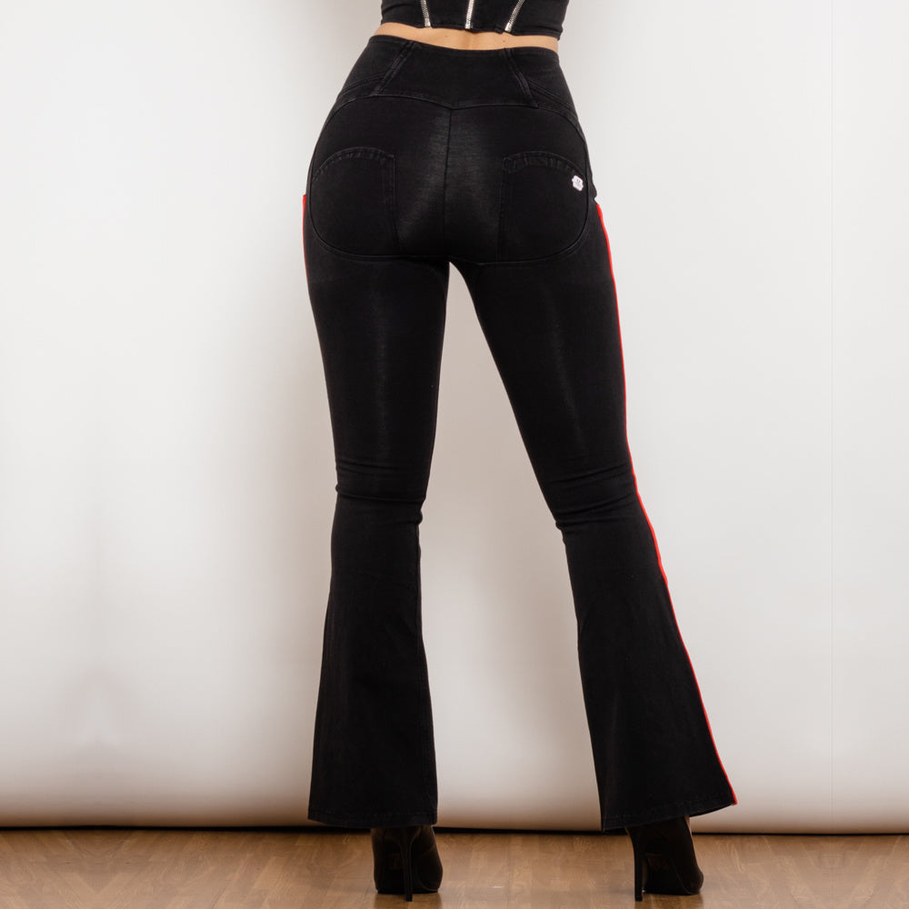 a woman wearing black pants