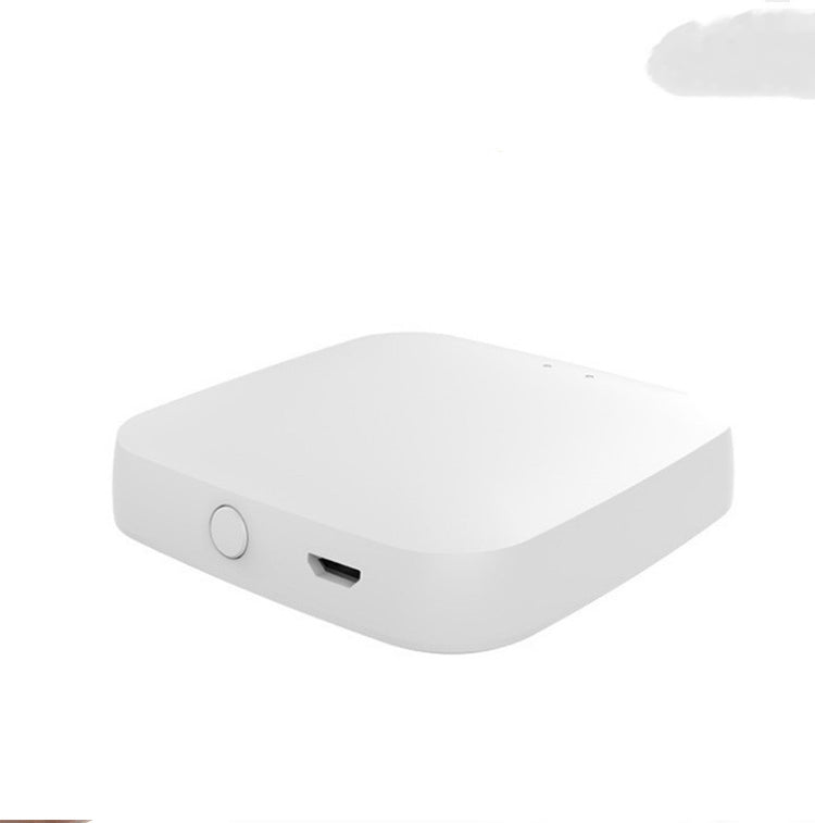 a white square device with a button