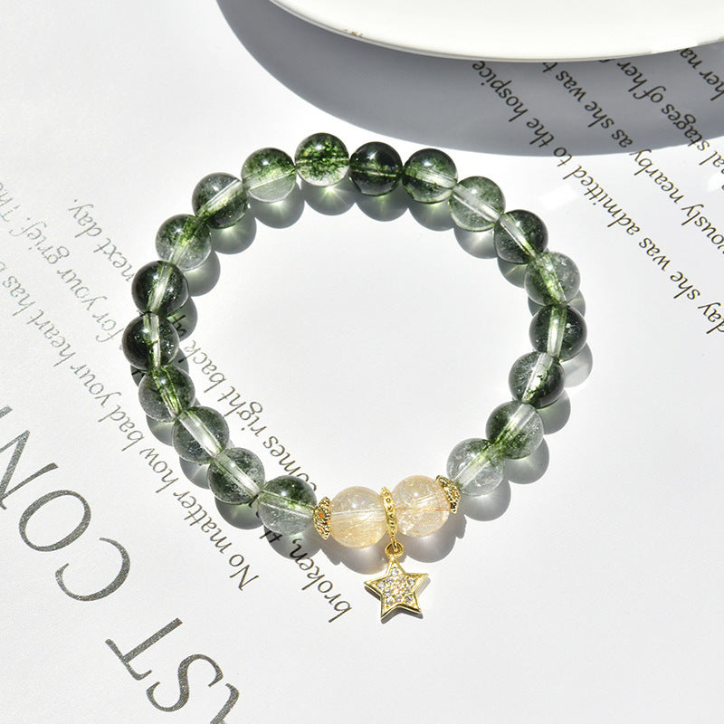a bracelet on a paper