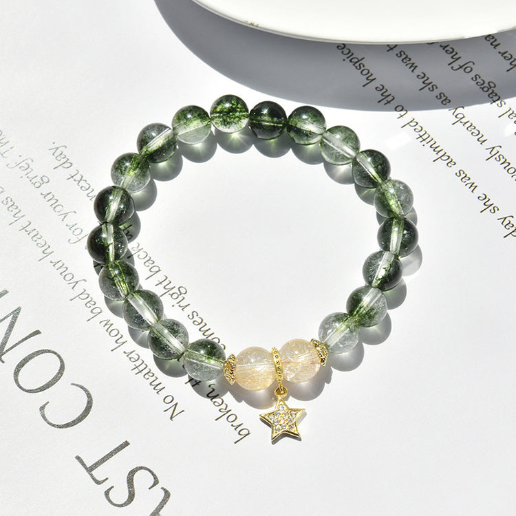 a bracelet on a paper